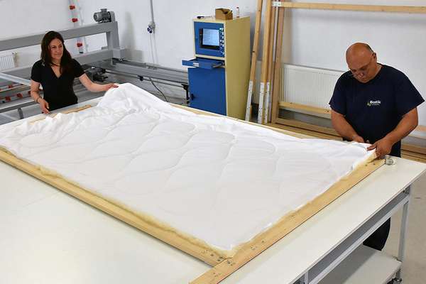 Revolana wool duvets are handcrafted on traditional frame.