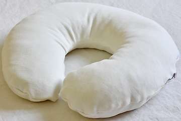Wool neck pillow with removable comfort cover