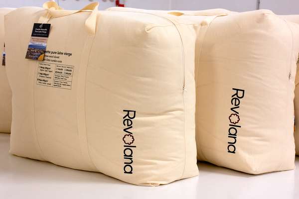Revolana wool duvets are packaged in a beautiful reusable bag made in organic cotton.