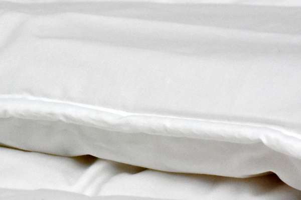 Revolana wool duvets are made using fine organic cotton twill fabric.