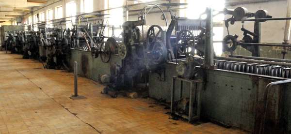 The wool scouring machine is a massive object.